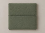 Cabecero modular nube verde, liso con bolsillo a media altura. Módulo de 30 × 30 × 3,5 cm.