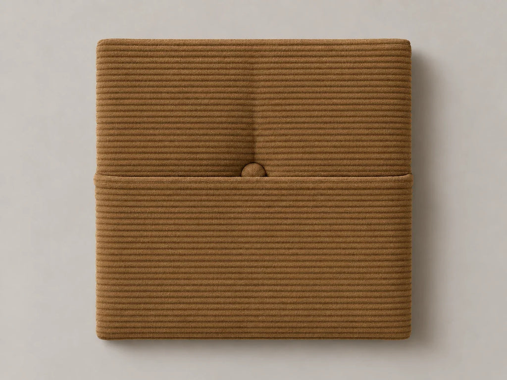 Cabecero modular pana marrón, capitoné con bolsillo a media altura y botón tapizado central. Módulo de 30 × 30 × 3,5 cm.