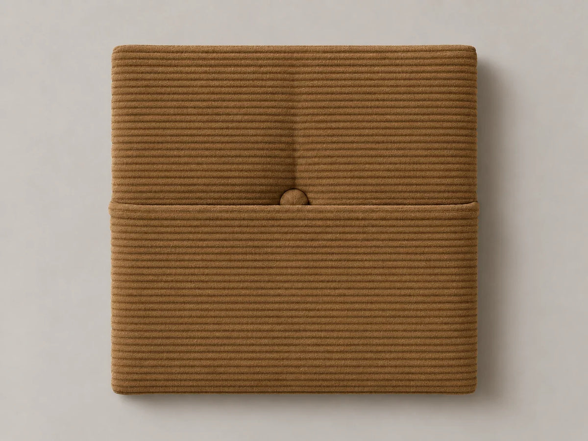 Cabecero modular pana marrón, capitoné con bolsillo a media altura y botón tapizado central. Módulo de 30 × 30 × 3,5 cm.