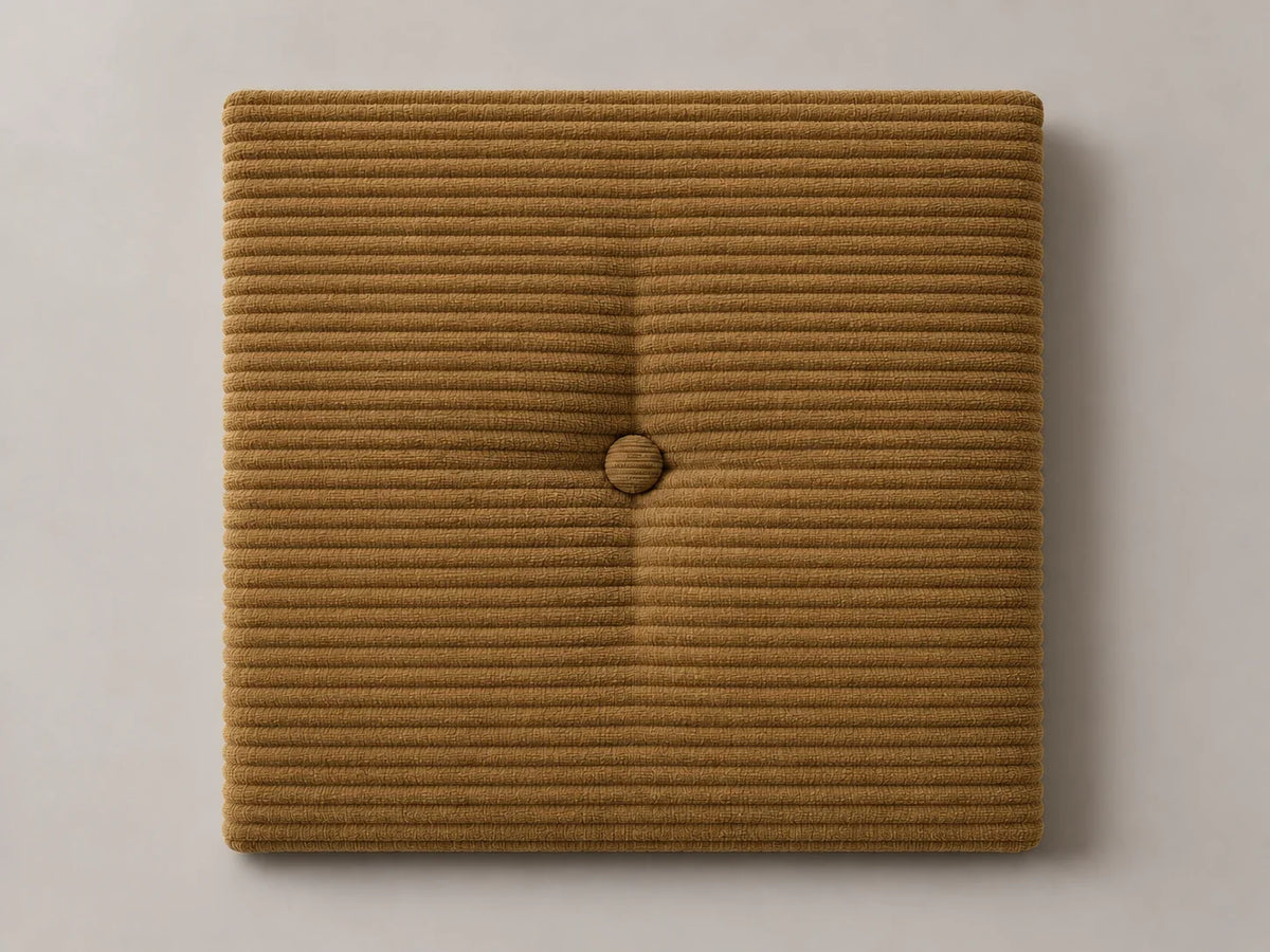 Cabecero modular pana marrón, capitoné con botón tapizado central. Módulo de 30 × 30 × 3,5 cm.