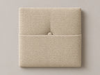 Cabecero modular tela entrelazada beige, capitoné con bolsillo a media altura y botón tapizado central. Módulo de 30 × 30 × 3,5 cm.