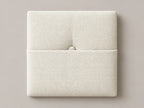 Cabecero modular tela entrelazada blanca, capitoné con bolsillo a media altura y botón tapizado central. Módulo de 30 × 30 × 3,5 cm.