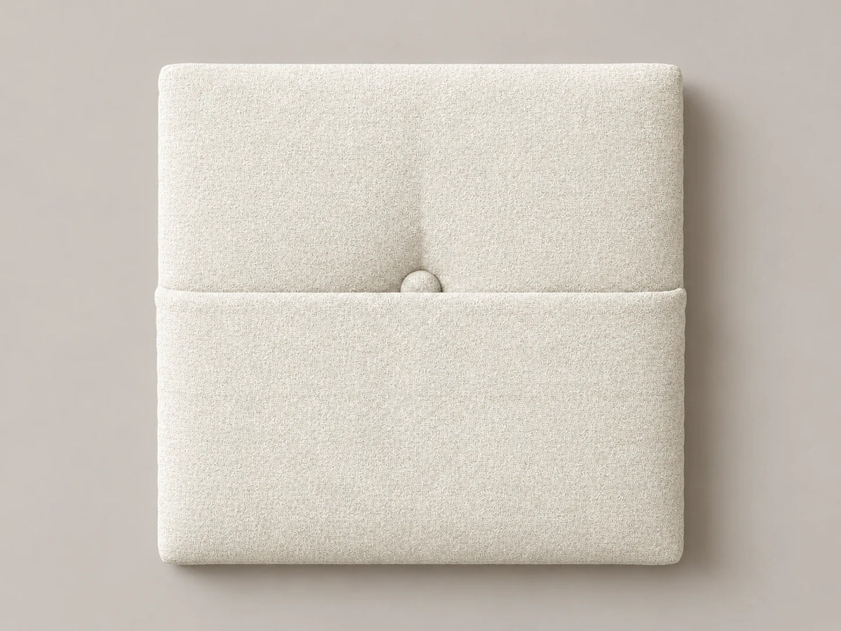 Cabecero modular tela entrelazada blanca, capitoné con bolsillo a media altura y botón tapizado central. Módulo de 30 × 30 × 3,5 cm.