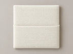 Cabecero modular tela entrelazada blanca, liso con bolsillo a media altura. Módulo de 30 × 30 × 3,5 cm.