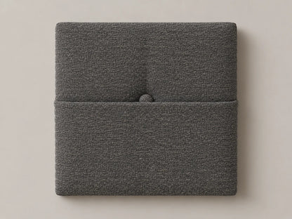 Cabecero modular tela entrelazada gris, capitoné con bolsillo a media altura y botón tapizado central. Módulo de 30 × 30 × 3,5 cm.