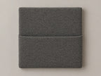 Cabecero modular tela entrelazada gris, liso con bolsillo a media altura. Módulo de 30 × 30 × 3,5 cm.