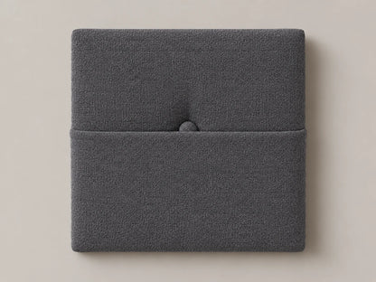 Cabecero modular tela tejida gris, capitoné con bolsillo a media altura y botón tapizado central. Módulo de 30 × 30 × 3,5 cm.