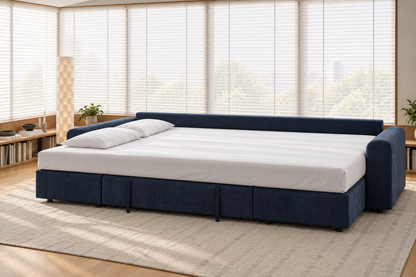 Nove de La Siesta abierto en modo cama, con sábana bajera y dos almohadas, en un salón